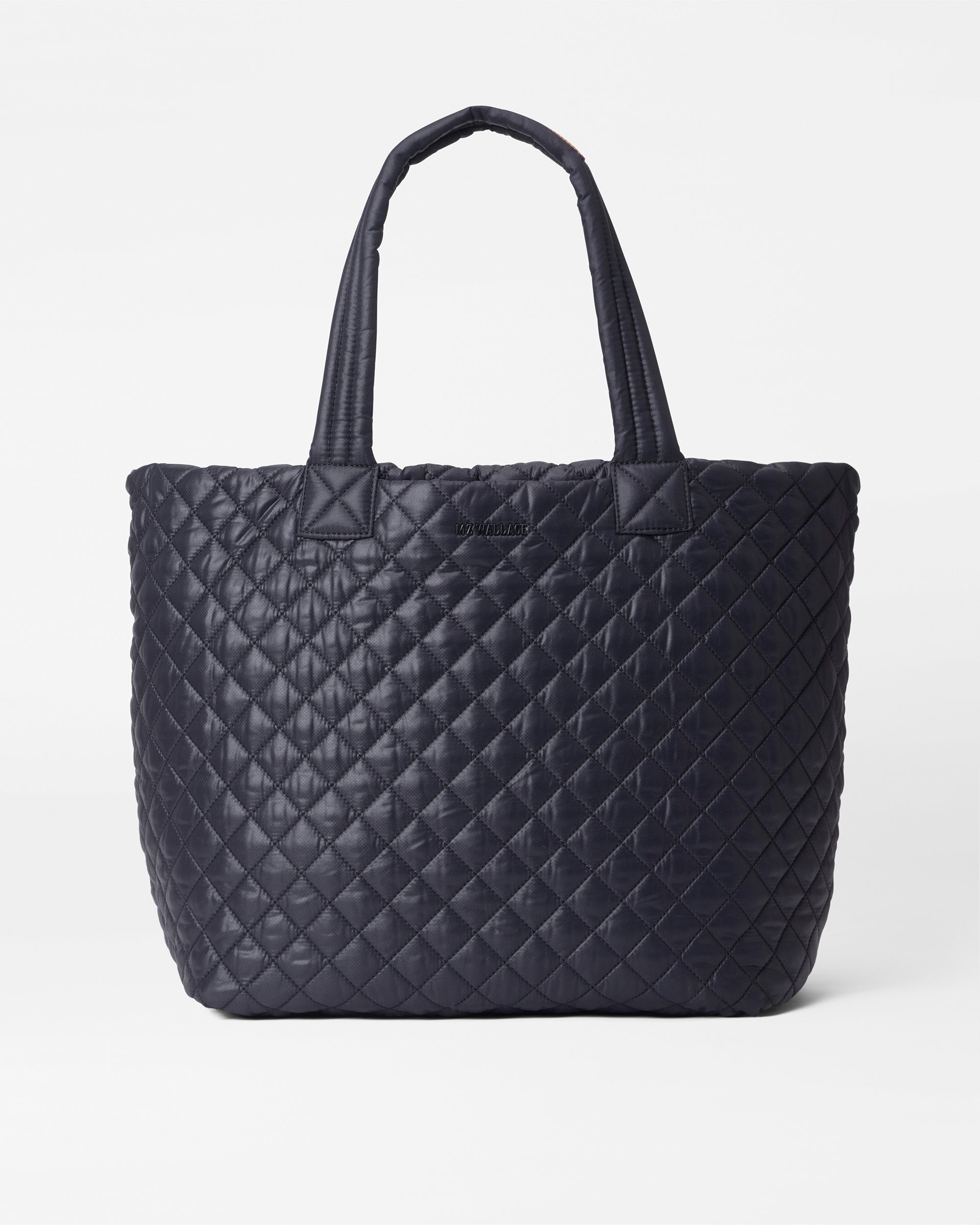 So many fashion girls own this supersized quilted shopping bag that fits all