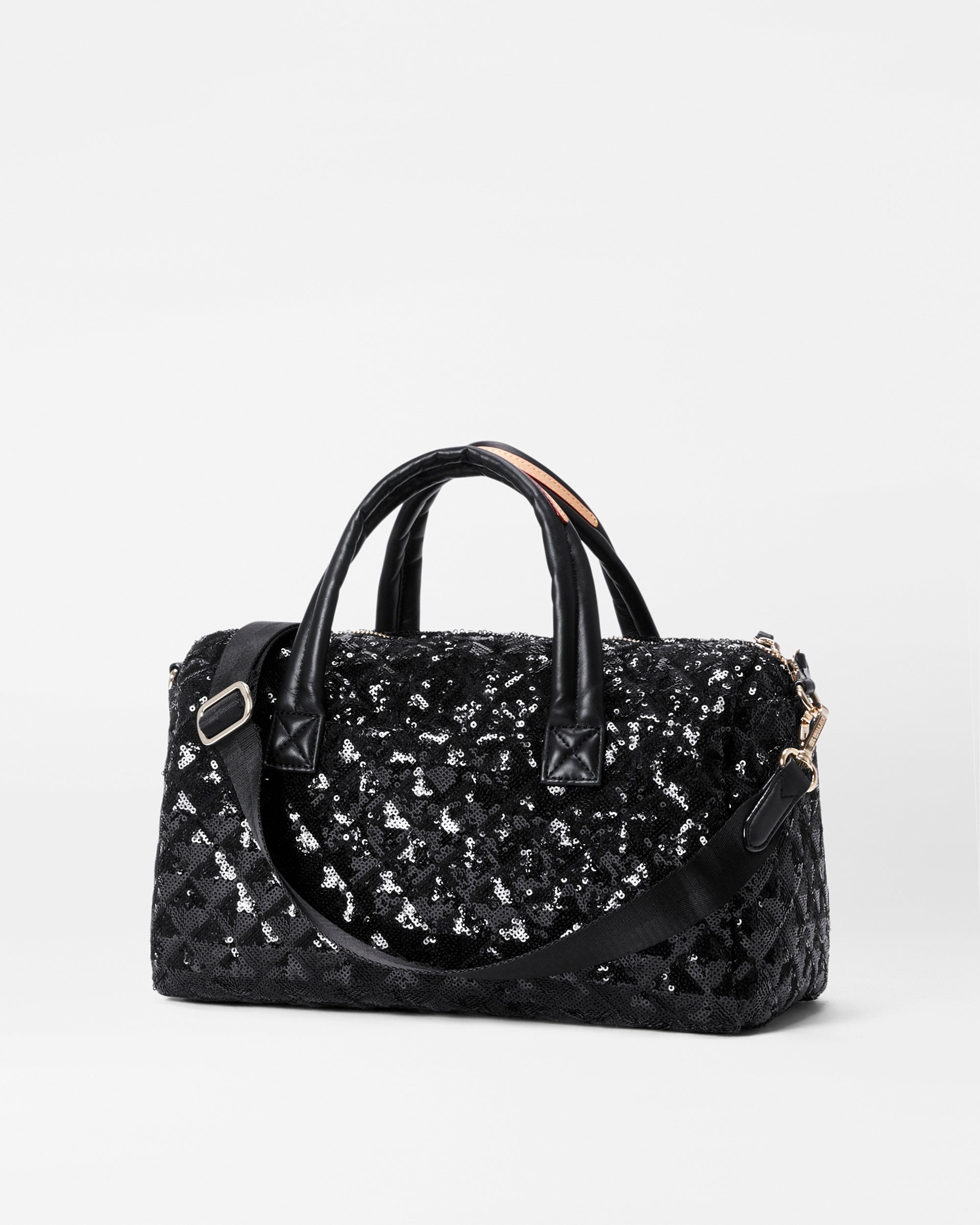 Louis Vuitton Sequin Monogram Bag. This tote features tall black