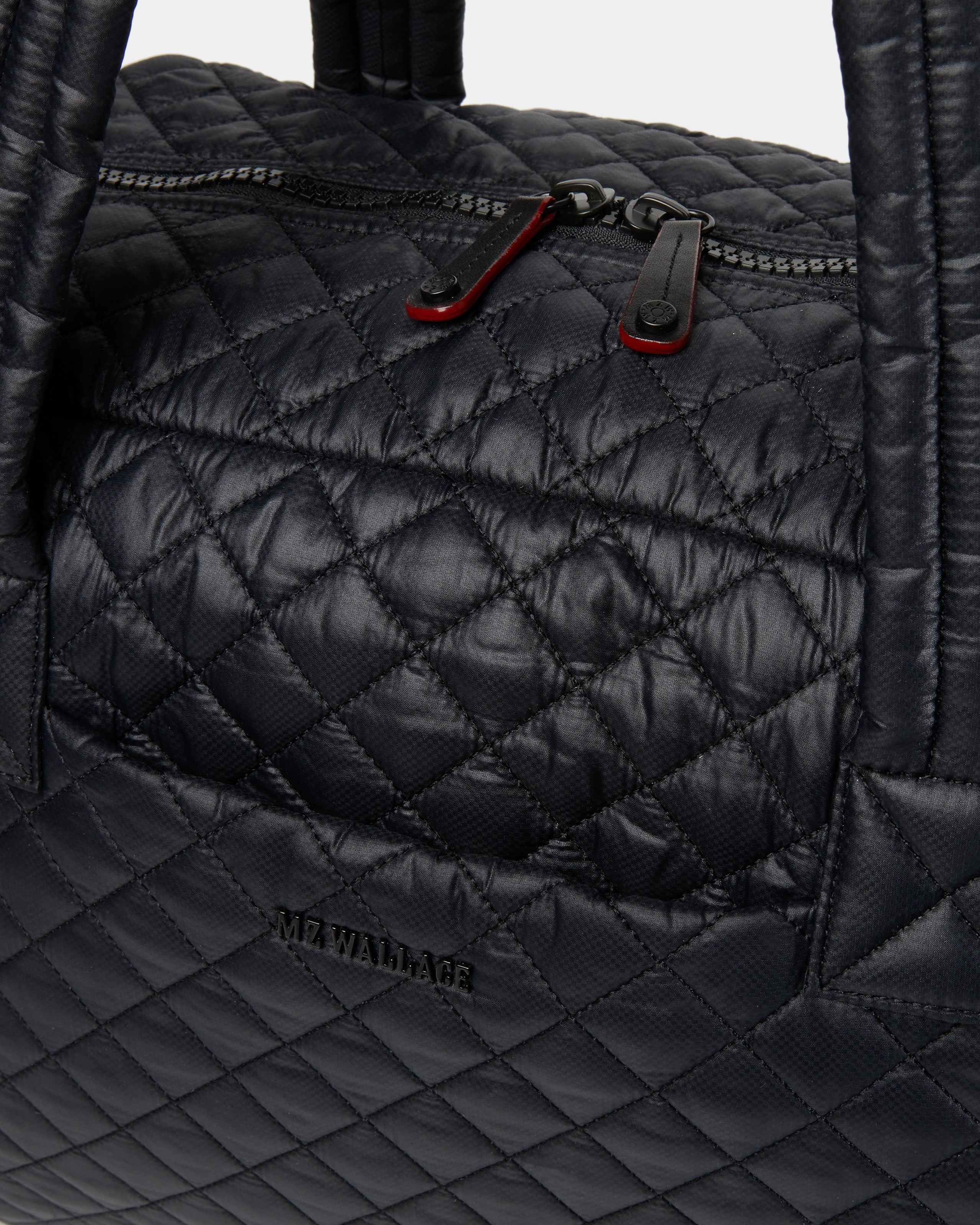 Black quilted duffle bag best sale